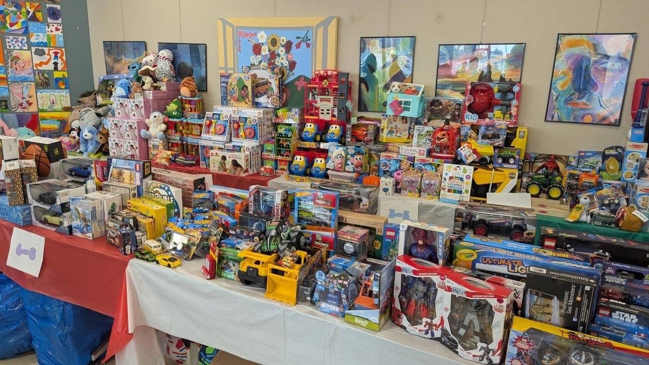 Donated toys displayed for a community holiday giveaway